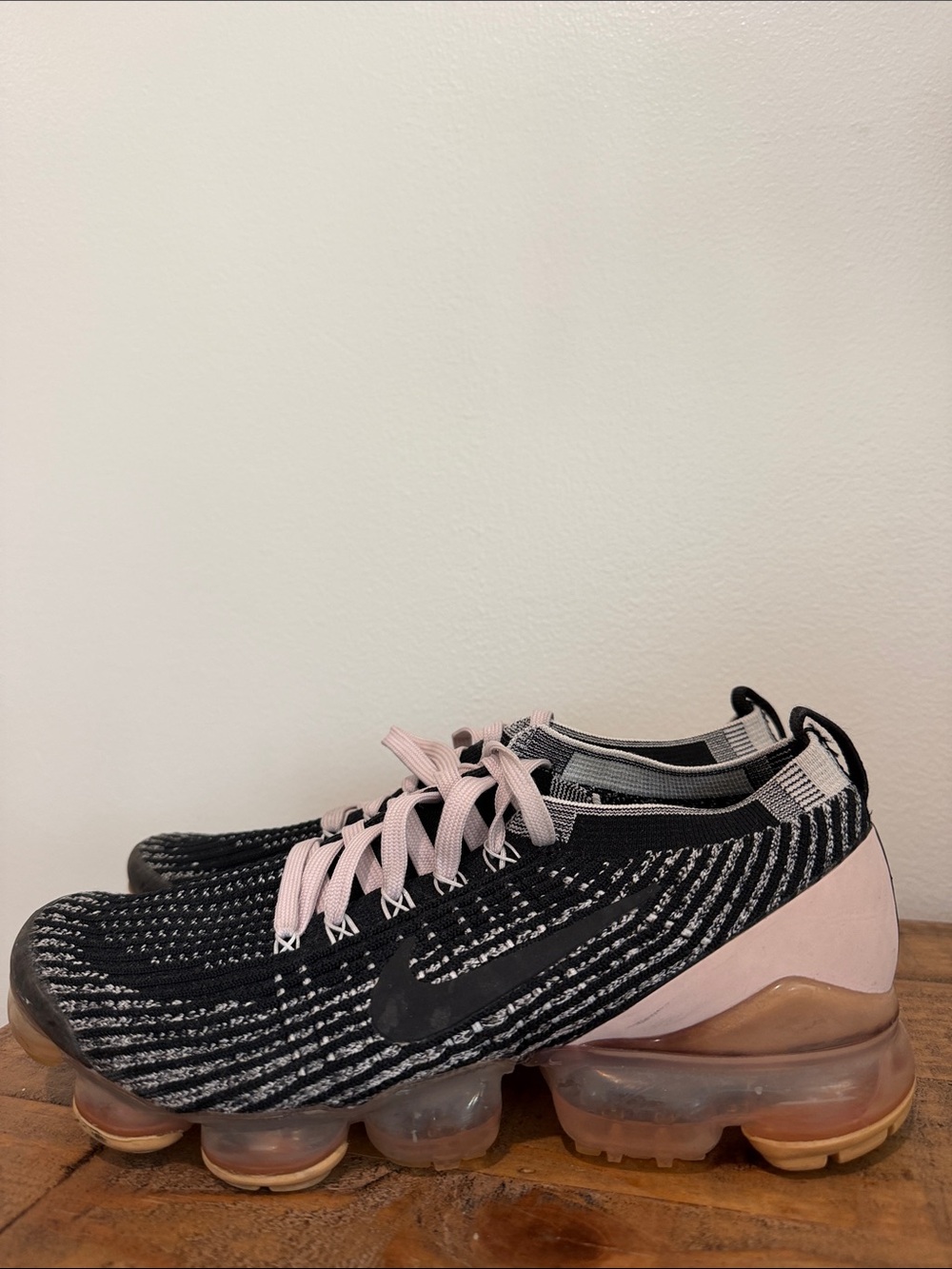 Nike Women's Black Knit Sneakers with Pink Accents